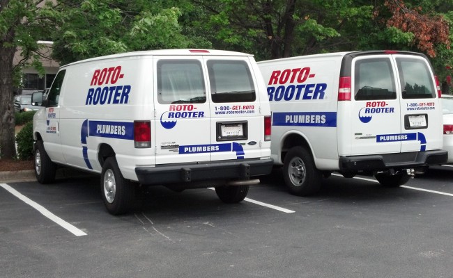 Pair of Roto-Rooter vans